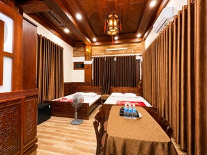 Family Double or Twin Room, Private Bathroom, City View | Premium bedding, free minibar items, desk, laptop workspace - Pho Thien Duong Homestay (Hue)