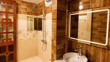 Luxury Double Room | Bathroom | Shower, hydromassage showerhead, hair dryer (on request), slippers