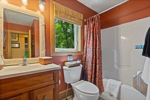 Ducha, secador de pelo y toallas