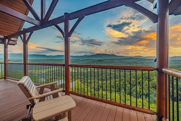 A wooden deck with a view of a mountainous landscape. - Unobstructed Views, Hot Tub, Game Room, Arcade, Family Retreat (Sevierville)