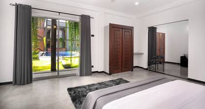 Charming Black 1 bedroom chalet in pleasant Ahangama with WiFi AC KITCHEN & POOL
