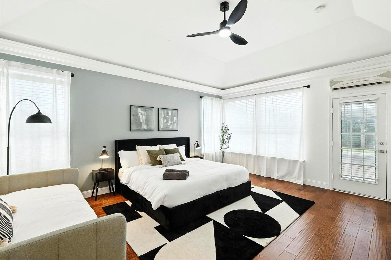 Bright and open with large windows and direct backyard access. Perfect for morning coffee or an afternoon nap in total comfort.