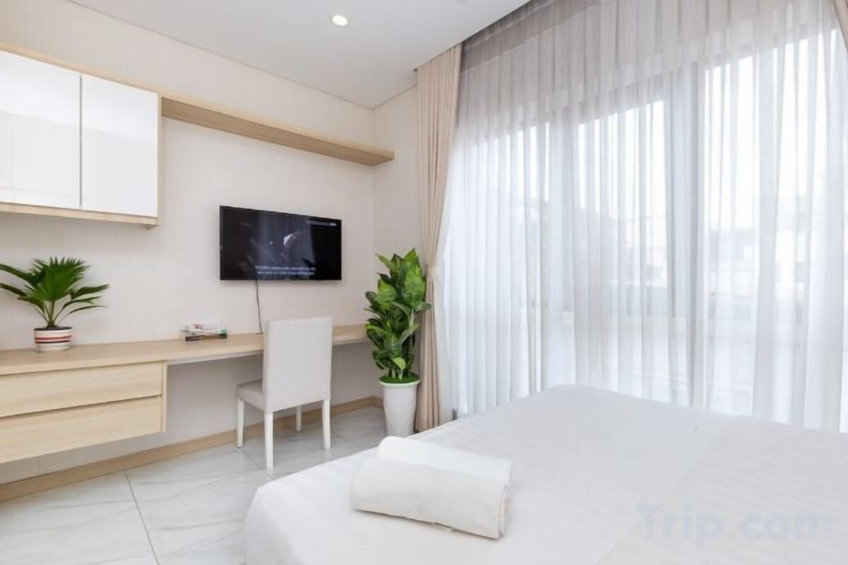 Premium bedding, pillowtop beds, laptop workspace, soundproofing