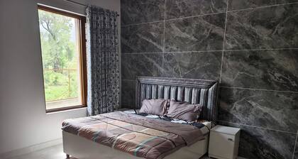 Palampur Villa 5BHK, nestled in the foothills of majestic Dhauladhar mountains.