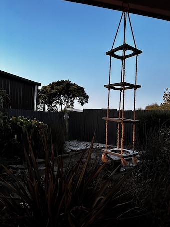Property grounds. Cozy Private Studio – 100m from the Beach | Port Waikato, NZ