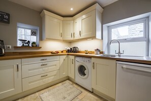 Fridge, microwave, dishwasher, coffee/tea maker