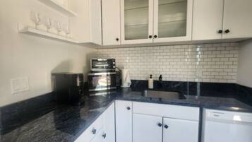 Fridge, microwave, dishwasher, coffee/tea maker