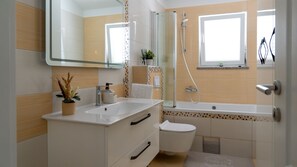 Shower, hair dryer, towels