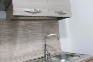 Fridge, microwave, coffee/tea maker, electric kettle