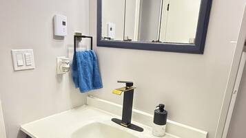 Bidet, towels, soap, toilet paper