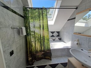 Shower, hair dryer, towels, soap