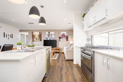 Modern Family Friendly Retreat Home with Sunroom