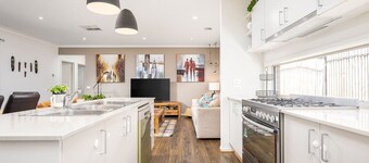 Modern Family Friendly Retreat Home with Sunroom