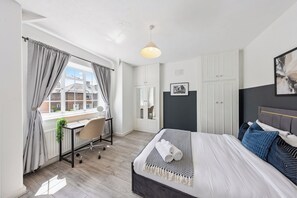 3 bedrooms, desk, iron/ironing board, travel cot