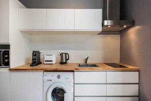 Fridge, microwave, stovetop, coffee/tea maker