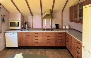 Fridge, stovetop, dishwasher, coffee/tea maker