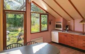 Fridge, stovetop, dishwasher, coffee/tea maker