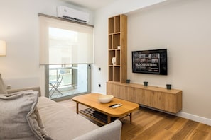 Appartement Deluxe, balcon, vue ville | Coffres-forts dans les chambres