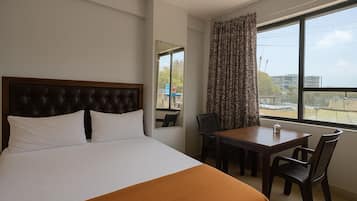 Deluxe Single Room, City View | Desk, laptop workspace, free WiFi