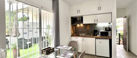 Fridge, microwave, coffee/tea maker, electric kettle