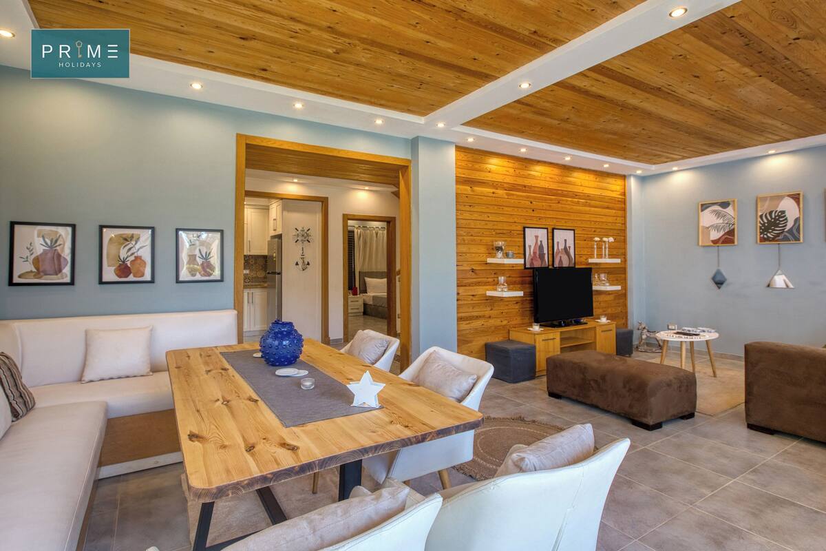 Deluxe-Chalet, 4 Schlafzimmer, Gartenblick | Wohnbereich