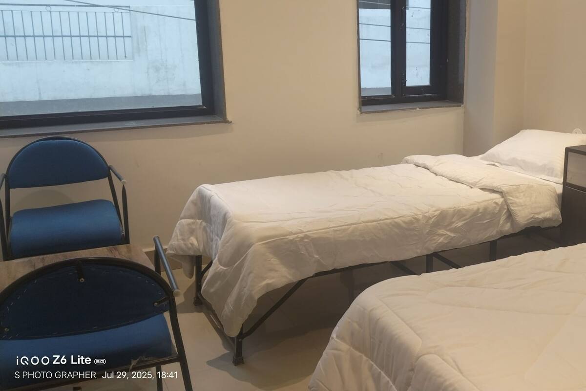 Basic Room | Egyptian cotton sheets, premium bedding, memory foam beds, in-room safe