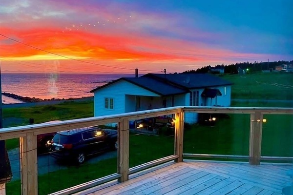 Breathtaking sunset views from the wraparound deck