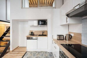 Apartemen | Dapur pribadi | Lemari es, microwave, oven, dan mesin pencuci piring