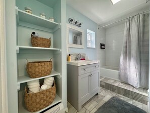 Hair dryer, towels, soap, toilet paper