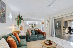 TV, offices - Stylish Lakeside Apartment w/ Spa Bath & Pool View (Cairns North)