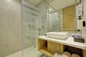 Suite | Bathroom | Shower, hair dryer, slippers, soap - Cygnett Inn Dibrugrah (Dibrugarh)