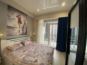 1 slaapkamer, een strijkplank/strijkijzer, wifi, beddengoed