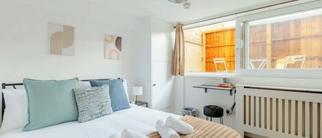 4 habitaciones, tabla de planchar con plancha, wifi y ropa de cama