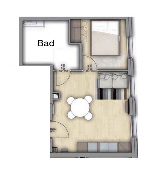 Un plan d’étage d’une chambre d’hôtel comprenant un lit, un petit coin salon, une salle de bain et une kitchenette.