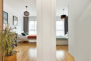 2 bedrooms, desk, iron/ironing board, travel crib