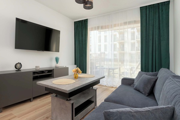 Cosy living room with access to the garden with terrace.