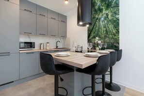Fridge, microwave, oven, stovetop - Modern Apartment with Garden | Parking in Garage (Gdańsk)