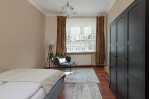 2 bedrooms, desk, iron/ironing board, travel crib