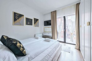 1 habitación, tabla de planchar con plancha, cuna de viaje y wifi