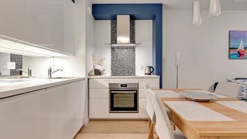 Fridge, stovetop, dishwasher, electric kettle