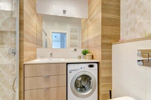 Shower, hair dryer, towels