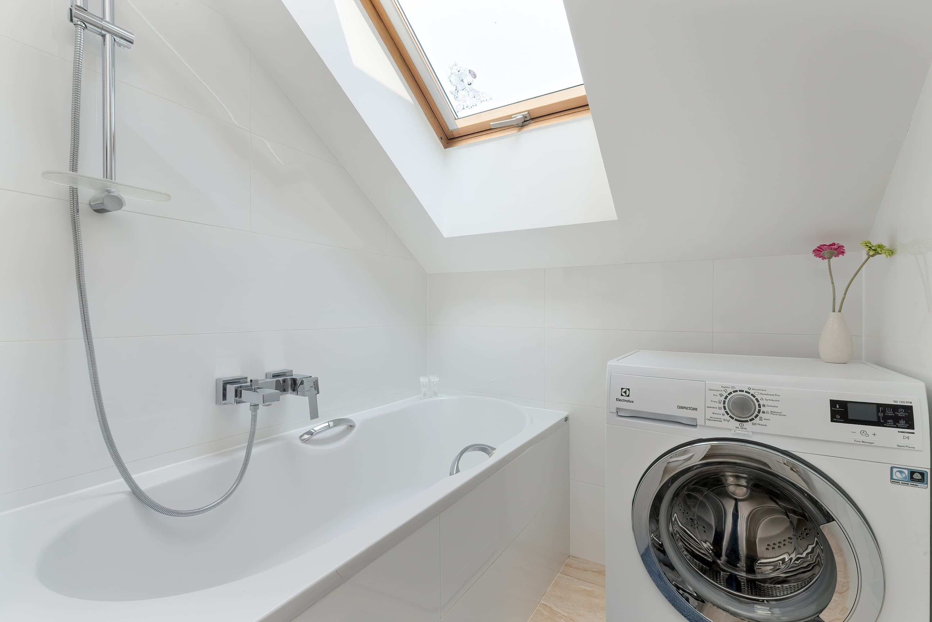 Shower, hair dryer, towels, shampoo