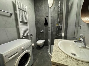 Shower, hair dryer, towels