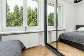 1 bedroom, desk, iron/ironing board, travel cot
