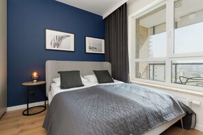 1 bedroom, desk, iron/ironing board, travel crib