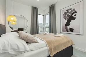 1 bedroom, desk, iron/ironing board, travel crib