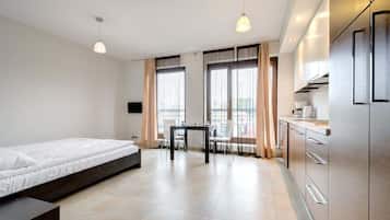 Een strijkplank/strijkijzer, wifi, beddengoed