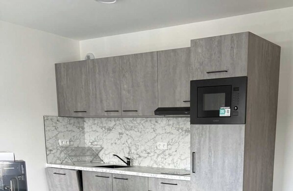 Apartment | Private kitchen | Fridge, microwave, oven, stovetop