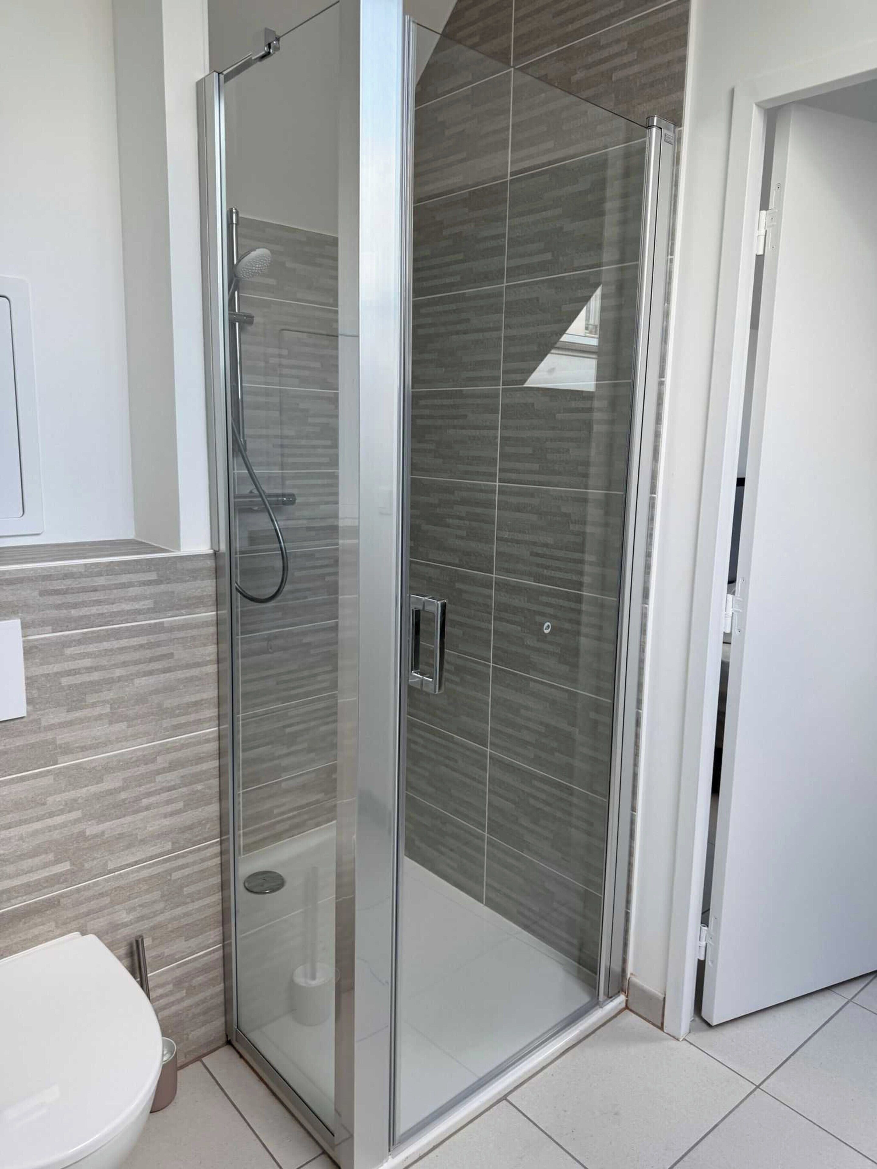 Appartement | Salle de bain | Séchoir à cheveux, serviettes fournies, shampooing
