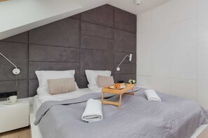 2 habitaciones, tabla de planchar con plancha, cuna de viaje y wifi 